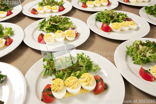 Image of many salads with egg