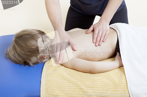 Image of little boy in physiotherapy 