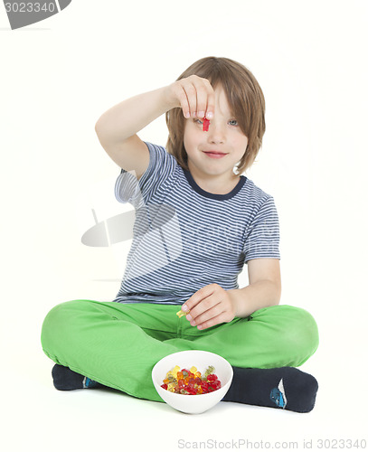 Image of boy with wine gums