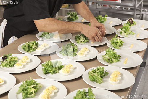 Image of cook decorated dish