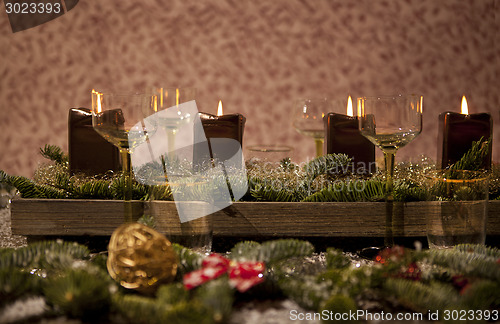 Image of christmas place setting with candles