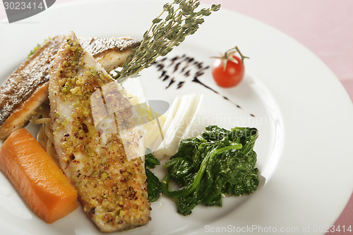 Image of fish dish with spinach