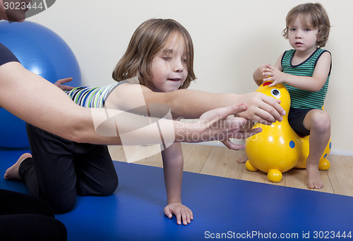 Image of Physiotherapy with two children