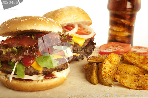 Image of two burger with cola