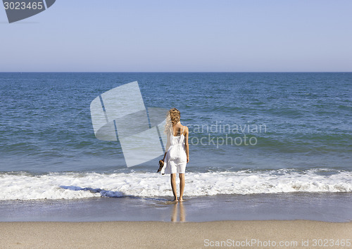 Image of Vacationer overlooking the sea