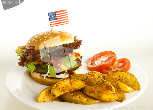 Image of burger with potato wedges 