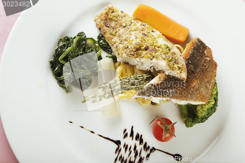 Image of fish fillet with spinach