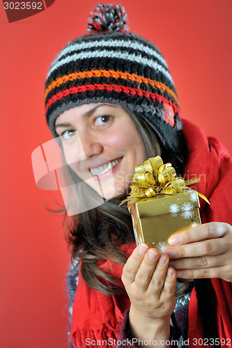 Image of winter girl with gift 