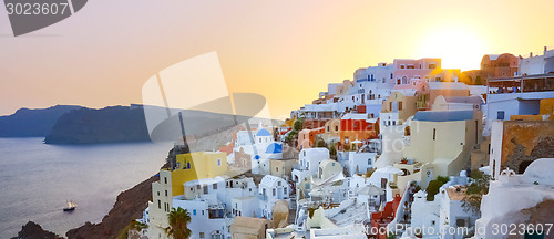 Image of Oia village on Santorini in sunset, Greece.