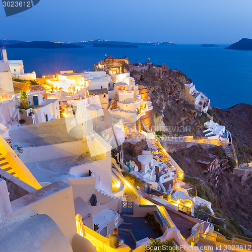 Image of Oia village on Santorini in sunset, Greece.