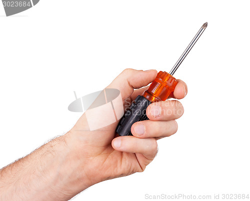 Image of Old used screwdriver with plastic grip