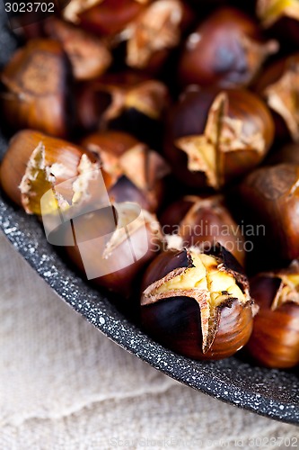 Image of roasted chestnuts in a pan