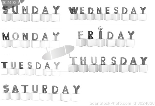 Image of Set of 3d colorful cubes with white letters - days of the week 