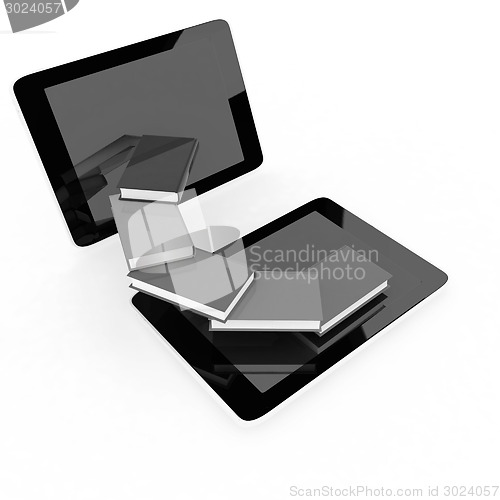 Image of tablet pc and colorful real books