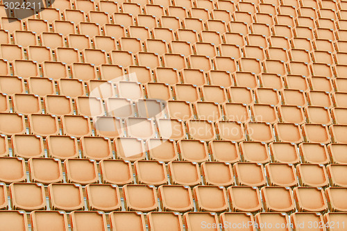 Image of Orange seat in sport stadium