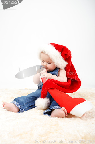 Image of Child girl with Christmas santa hat