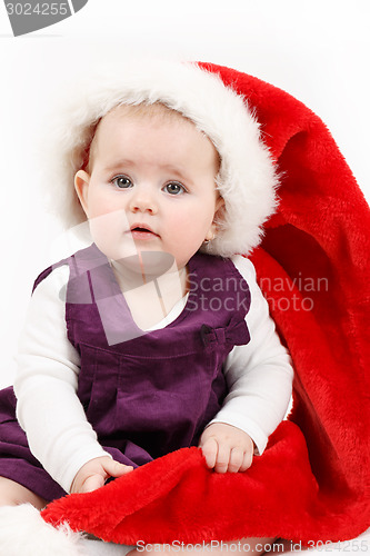 Image of Child girl with Christmas santa hat