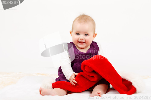 Image of Child girl with Christmas santa hat