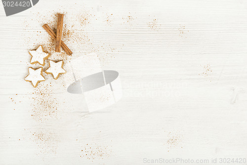 Image of White background with cinnamon stars