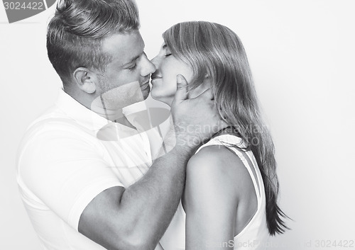 Image of Couple kiss black white