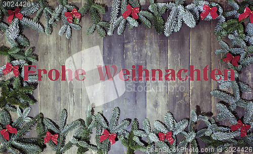 Image of wood background frohe weihnachten