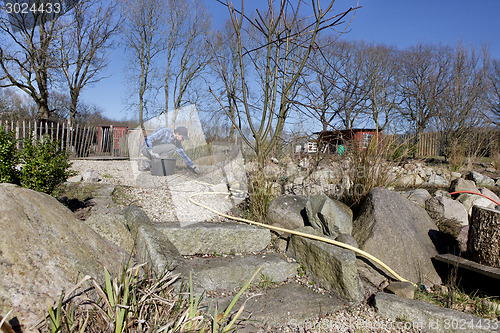 Image of man working in garden