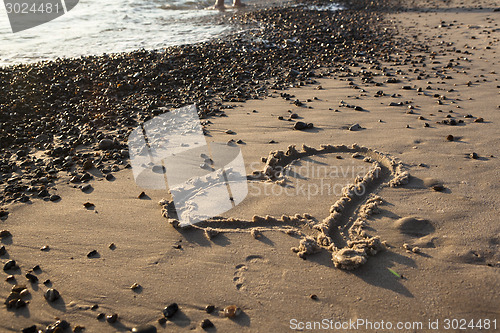 Image of Heart in the sand beach