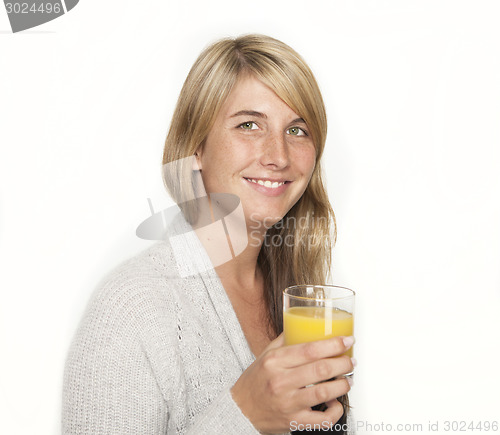 Image of young woman with glass of juice