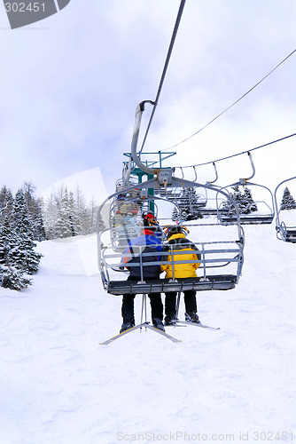 Image of Skiers on chairlift