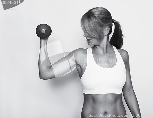 Image of Fitness woman with Top black and white