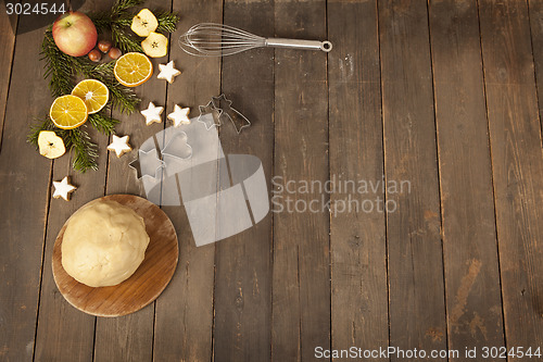 Image of cookie dough ready with piercing shapes