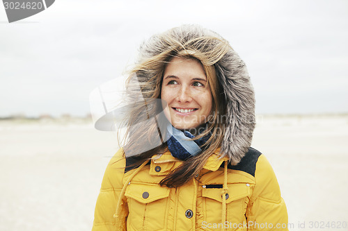 Image of Woman in winter on the beach