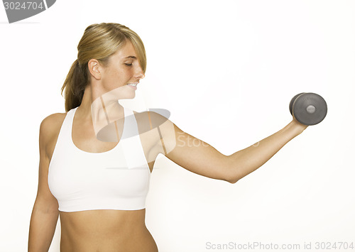 Image of Weight training young woman