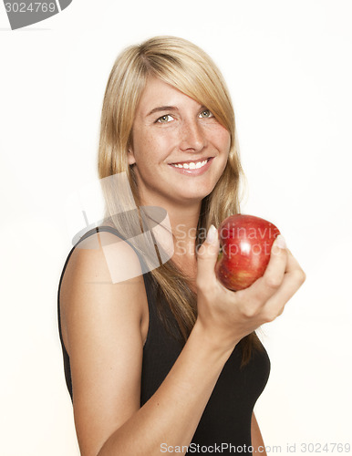 Image of young woman with apple