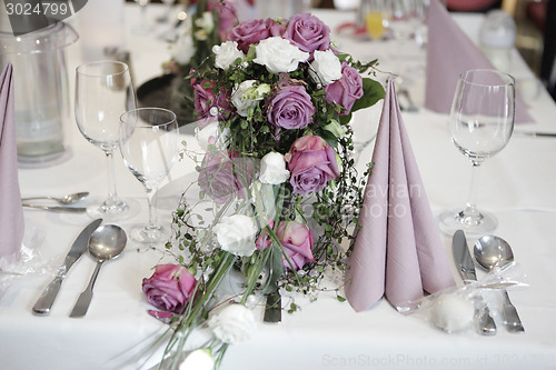 Image of Table setting with flowers