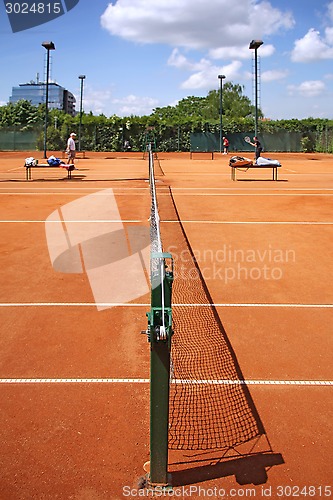 Image of Playing tennis