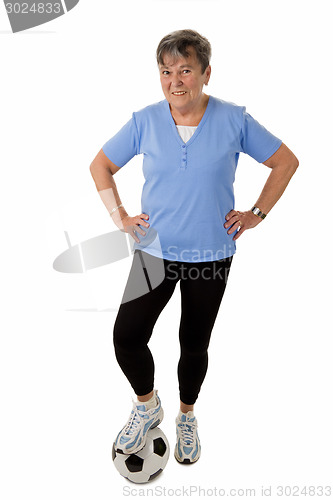 Image of Old woman playing football