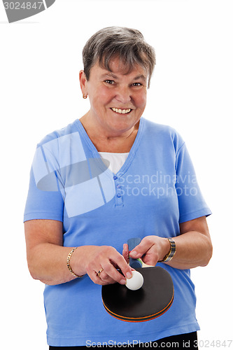 Image of Senior woman playing pingpong