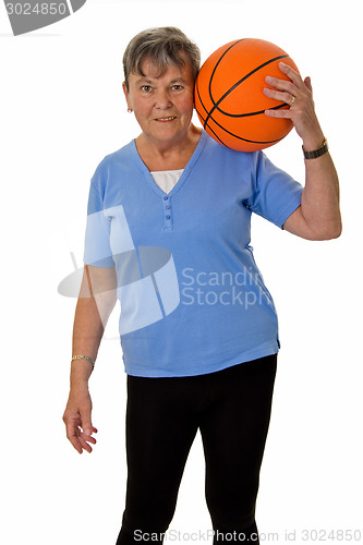 Image of Senior woman with baskektball