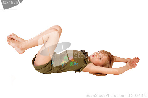 Image of Girl lying on floor.