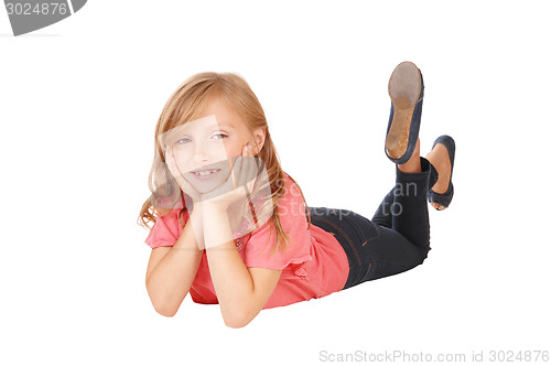 Image of Little girl lying.