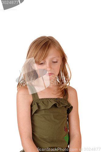 Image of Sad looking small girl.
