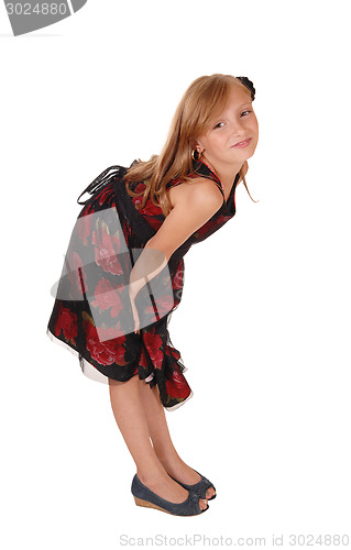 Image of Girl bending down.