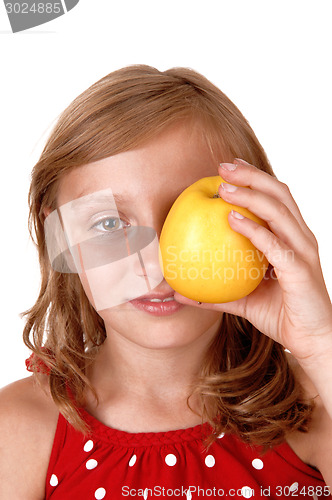 Image of Girl holding a apple.