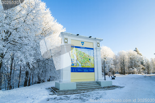 Image of A beautiful city park with trees covered with hoarfrost