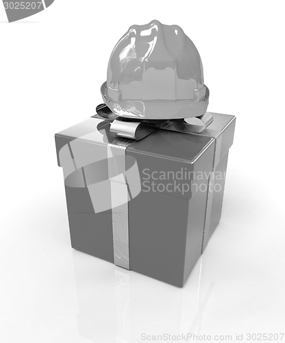 Image of hard hat on a red gift