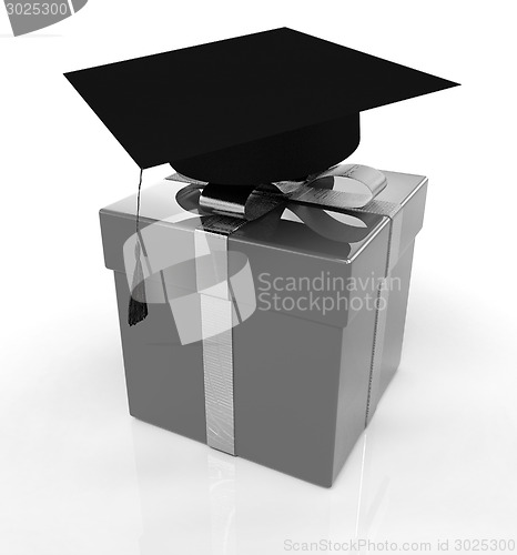 Image of graduation hat on a red gift