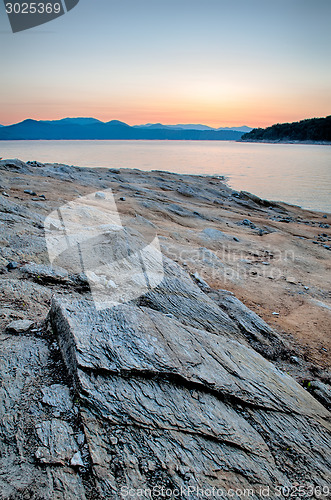 Image of Beautiful Mountain Lake Shoreline on a sunny Day