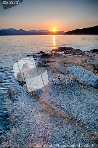 Image of Beautiful Mountain Lake Shoreline on a sunny Day