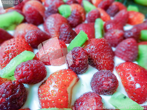 Image of Strawberry & kiwi birthday  cake with candles